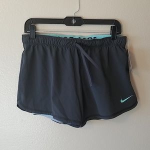 NWT Nike running shorts with spandex